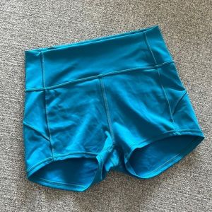 Teal Lululemon Spandex Mid High rise shorts size 6 small EUC 2 inch inseam